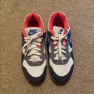 Nike Women's Gray, White, and Blue Sneakers